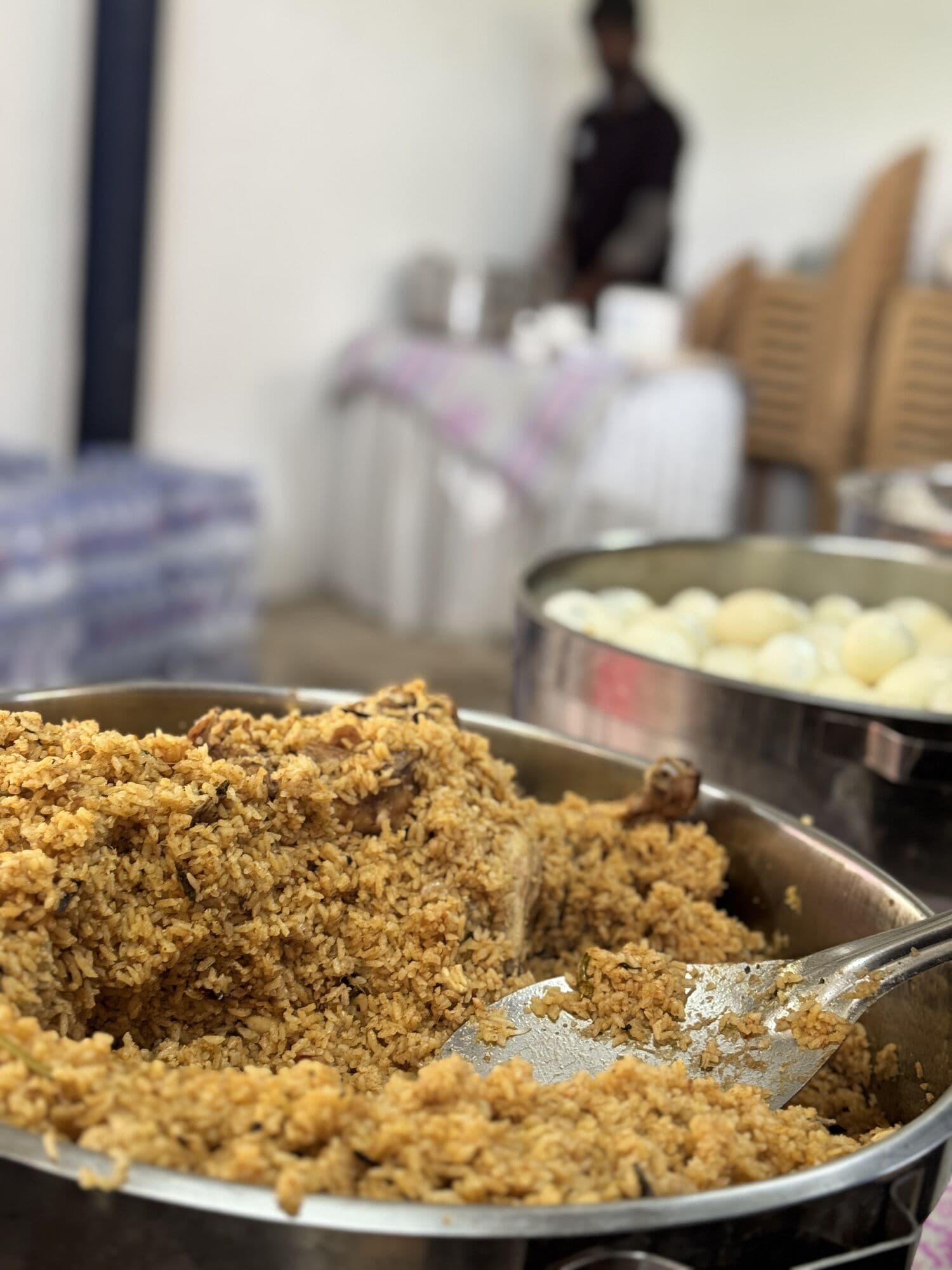 A large tray of SDR's biryani at a catered event
